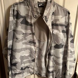 Nike rain jacket with hood that folds up. Size XL